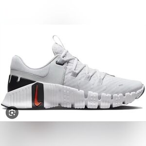 Size  7.5 Nike Free Metcon 5 Women'S White and Black Sneakers with Orange Swoosh